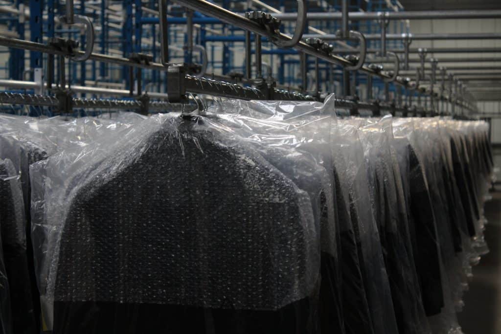 Hanging Garments in Beckton Warehouse