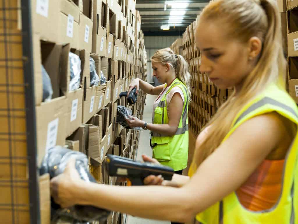 Warehousing operatives picking goods